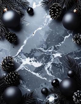 モノクロの冬：大理石と黒いクリスマス飾りの写真