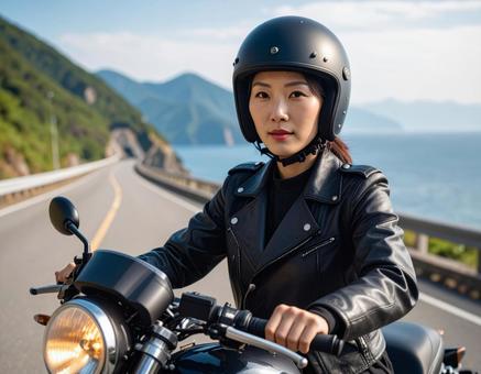バイク乗りの女性 バイク乗りの女性の写真
