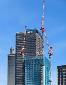 建設中の高層ビル 建築現場,建設現場,クレーンの写真素材