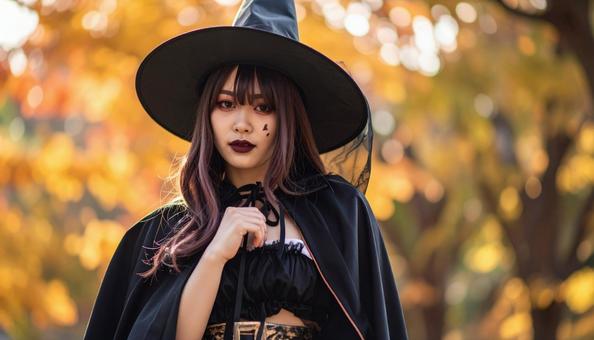 ハロウィン仮装 魔女に扮する女性 ハロウィン仮装 魔女に扮する女性の写真