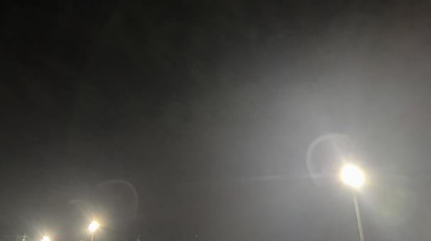 駐車場の照明と夜空とフレア 照明,光,フレアの写真素材