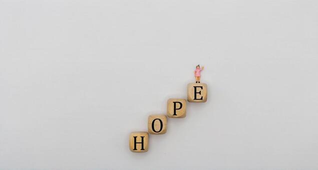 文字ブロックと人形「HOPE」 ミニチュア,人形,ブロックの写真素材