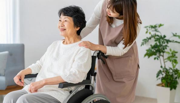 美容師に髪の手入れをされるシニア女性  美容師に髪の手入れをされるシニア女性の写真