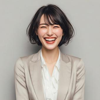 満面の笑顔で笑う若い日本人女性 満面の笑顔で笑う若い日本人女性の写真