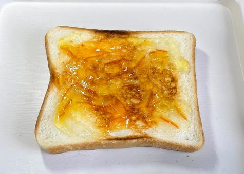 マーマレードを塗ったトースト_711G トースト,マーマレード,こんがりの写真素材