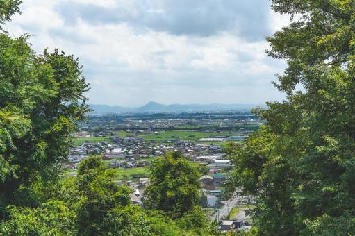岐阜県の見晴らし良い山道と街並み 岐阜県の見晴らし良い山道と街並み 岐阜県,見晴らし,風景の写真素材