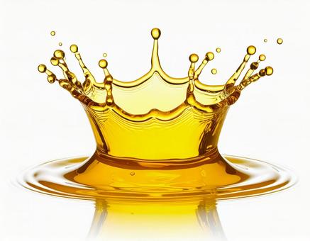 黄色い透明な液体のミルククラウンと波紋 黄色い透明な液体のミルククラウンと波紋の写真