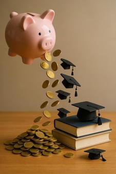 学びへの投資(貯金箱と学位帽) 学びへの投資(貯金箱と学位帽)の写真