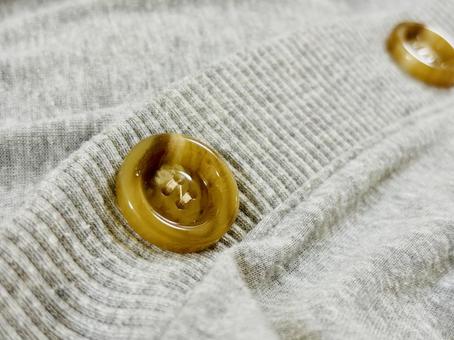 洋服についたボタン2つ 洋服についたボタン2つ ボタン,洋服,洋服のボタンの写真素材