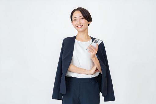 携帯を持つ女性 ビジネス,オフィス,ビジネスウーマンの写真素材