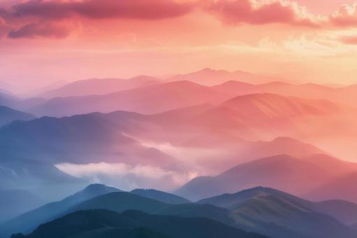 夏の早朝に広がる幻想的な山並み 夏の早朝に広がる幻想的な山並みの写真
