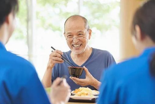 Elderly people having fun eating at a nursing facility, senior citizens, meal, care facilities, JPG