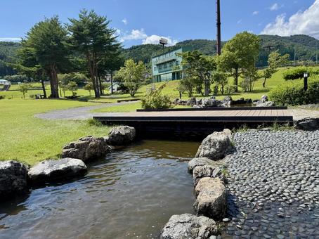 真夏日の滝沢総合公園:水遊び場 真夏日の滝沢総合公園:水遊び場 滝沢総合公園,岩手,滝沢の写真素材