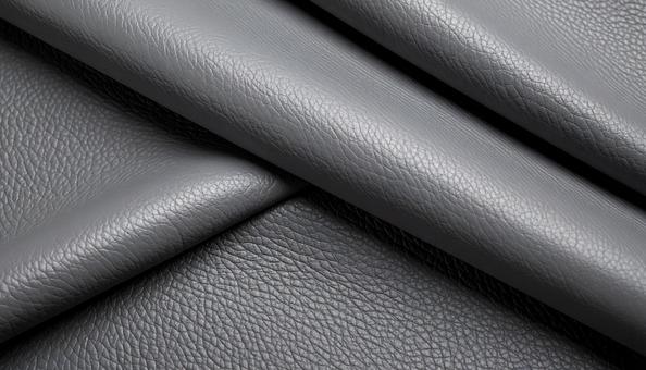グレー色のリアルな質感のレザーの背景の写真