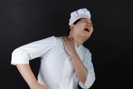 肩を痛めた料理人 肩を痛めた料理人の写真