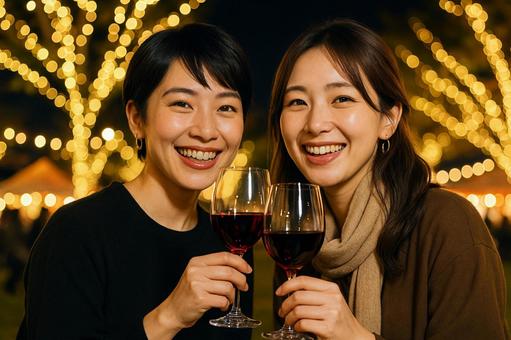 イルミと乾杯笑顔 イルミと乾杯笑顔の写真