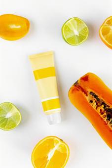 Tropical fruit cross section and yellow tube, JPG