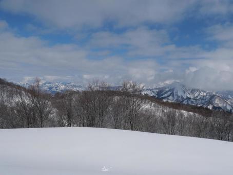 雪山 冬の風景,スキー場,青空の写真素材