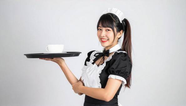 メイドカフェ メイドコスプレの女性 メイドカフェ メイドコスプレの女性の写真