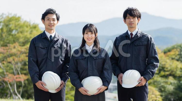 作業服の若手社員チーム・建設業・現場作業 作業服,若手社員,建設業の写真素材