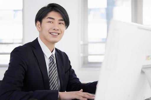 Japanese male businessman working on a computer with a smile, JPG Japanese male businessman working on a computer with a smile, business, office, businessman, JPG