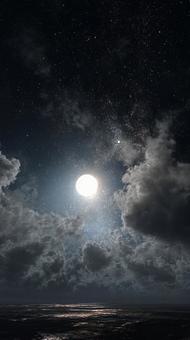 満月と星が輝く幻想的な夜空 満月と星が輝く幻想的な夜空の写真