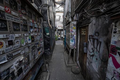Stickers and graffiti in the backstreets, JPG