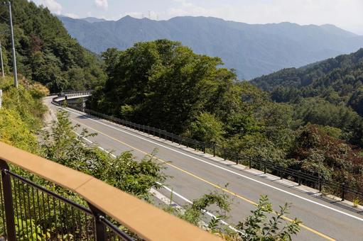 道路 道路 道路,コーナー,山の写真素材