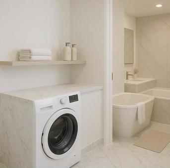 高級感あるランドリースペースと浴室の写真
