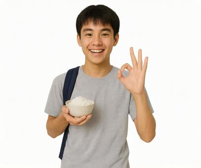 半袖で笑顔の男性のオッケーの指と白米 半袖で笑顔の男性のオッケーの指と白米の写真