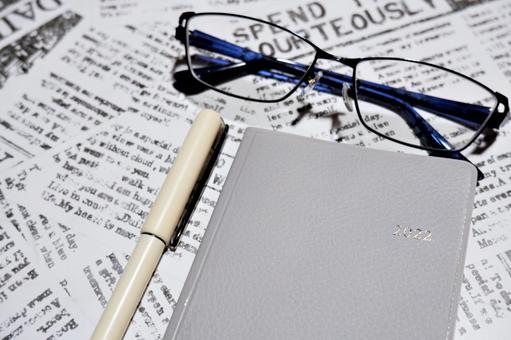 Notebook and glasses, JPG Notebook and glasses, JPG