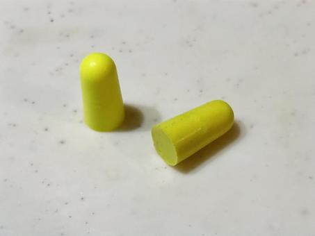 黄色い耳栓 黄色い耳栓 耳栓,耳,小物の写真素材