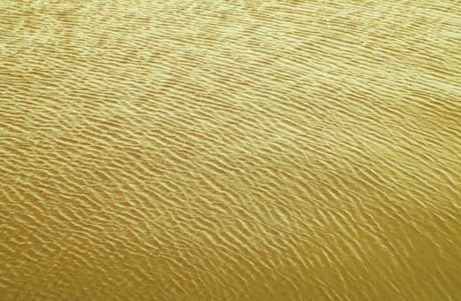 テクスチャ-背景 黄金色の水面 テクスチャ-背景 黄金色の水面の写真