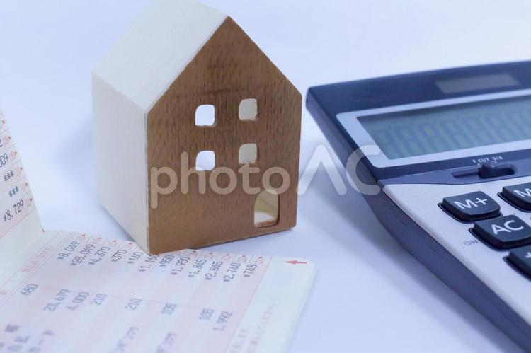 住宅ローンイメージ７ ローン,通帳,電卓の写真素材