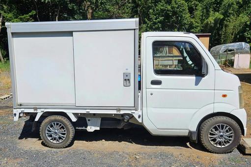 Next to a light cargo truck (light truck), JPG Next to a light cargo truck (light truck), JPG