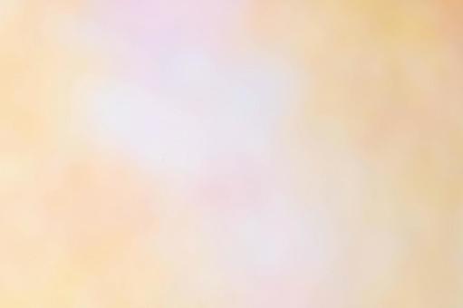 ピンクとオレンジの淡いグラデーション背景 背景,素材,ぼかしの写真素材