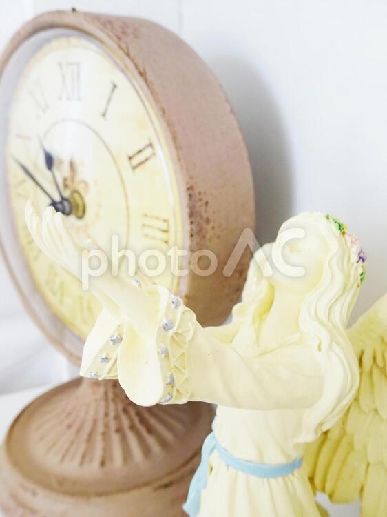 天使と時計 天使,エンジェル,時計の写真素材