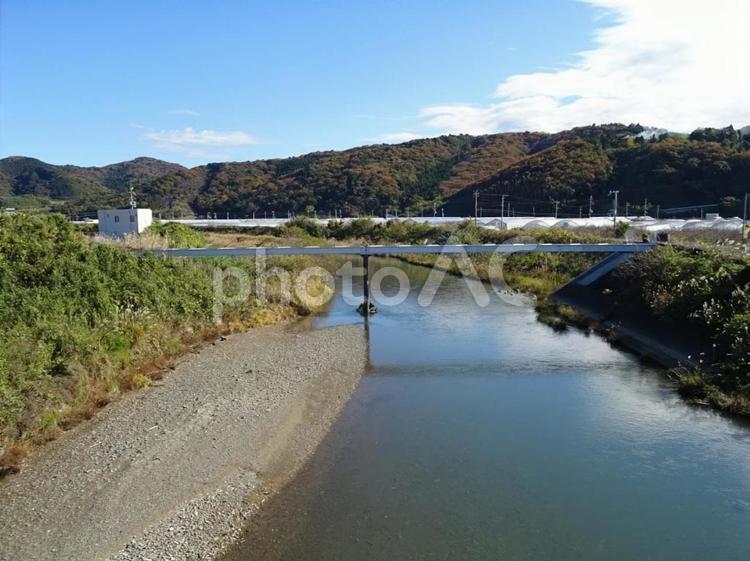 川と山並みに架かる橋 橋,川,山の写真素材