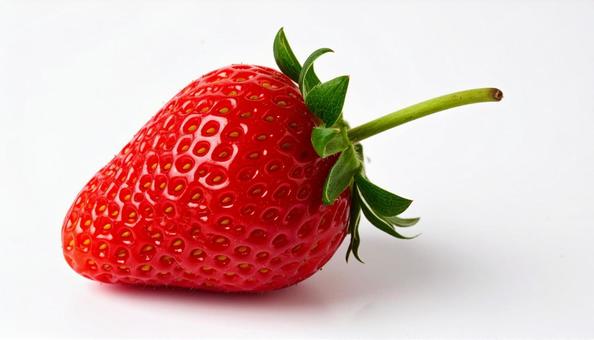 白い背景にへた付きのイチゴの写真