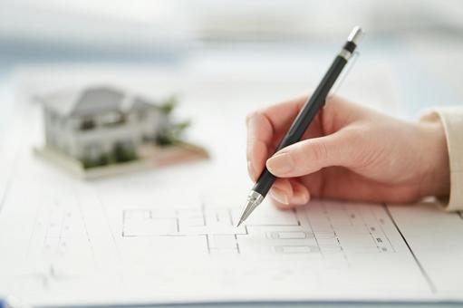 Asian architect writing on building drawings, JPG Asian architect writing on building drawings, architects, drawing, drafting, JPG
