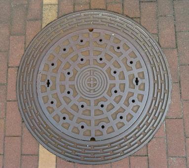 マンホール 秋田市章入り マンホール 秋田市章入り マンホール,蓋,市章の写真素材