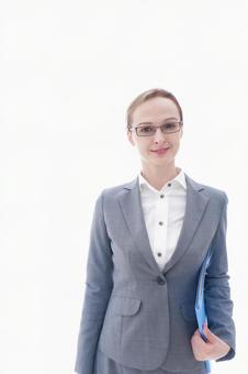 スーツを着た笑顔のビジネスウーマン 教師,転勤,ロシア人の写真素材