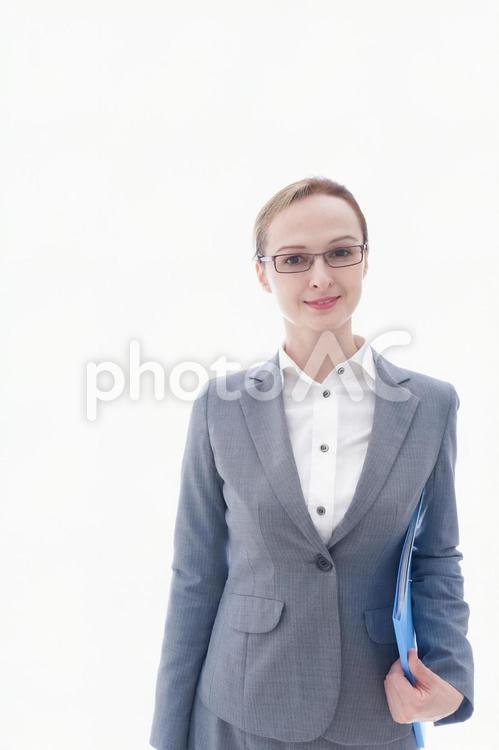 スーツを着た笑顔のビジネスウーマン 教師,転勤,ロシア人の写真素材