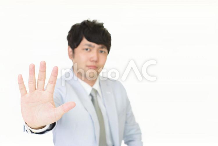 停止の意思表示をする男性 会社員,ビジネス,ビジネスマンの写真素材