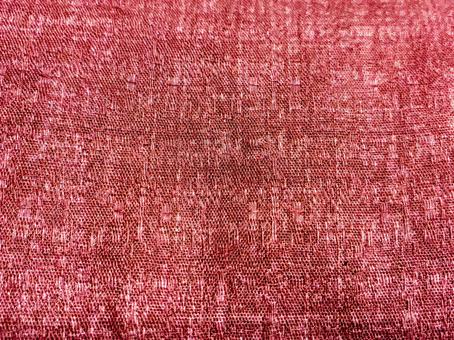 温かみのある赤の背景 布,テクスチャ,背景の写真素材