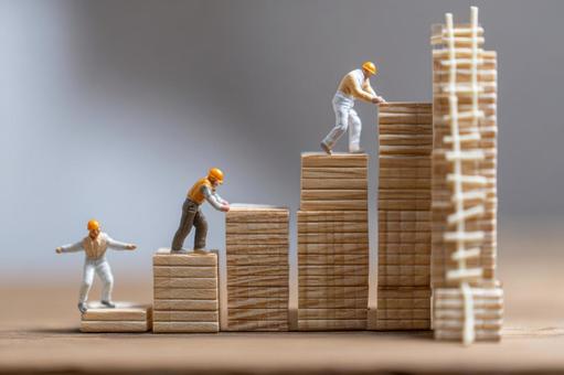 協力と努力が実を結ぶ：ビジネス成功の階段の写真