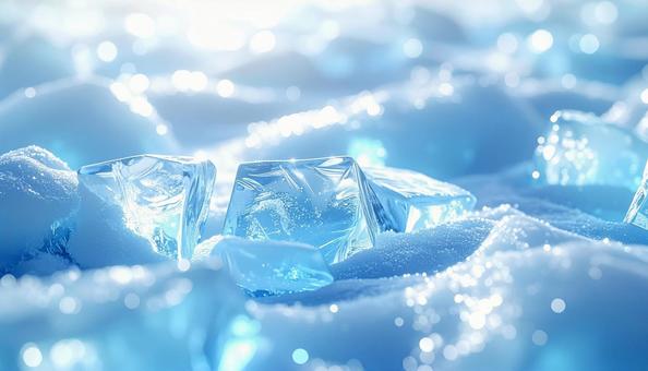 雪の上に並ぶ透明な氷のブロックの写真