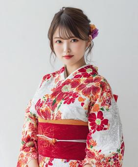鮮やかな着物を着た日本人女性 鮮やかな着物を着た日本人女性の写真