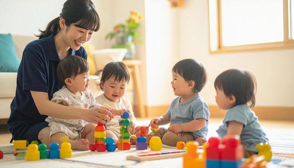 笑顔の保育士と遊ぶ子どもたち 笑顔の保育士と遊ぶ子どもたちの写真