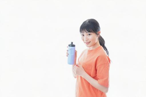 プロテインを飲む若い女性 部活,栄養,女性の写真素材